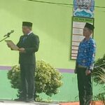 Camat Lingga Bayu Jadi Pembina Upacara Pada Peringatan Harlah Pendidikan Nasional Ke -77 