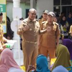 Pj. Bupati Langkat Faisal Hasrimy Serahkan Bantuan di Kecamatan Stabat dan Wampu